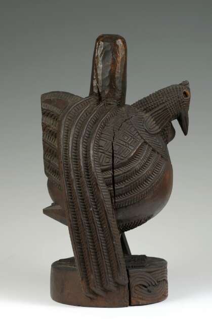 This wood and iron altar piece, probably created in devotion to maternal ancestors in the Benin Kingdom, depicts a hen with a densely textured surface. Patterns on the bird represent feathers, and designs on the base refer to Igbesanmwan, the Benin Oba's wood and ivory carver's guild. The Benin Bronze piece, held at the University of Iowa Stanley Museum of Art since 1986, was returned to the Royal Court in a July 15 ceremony in Benin City, Nigeria. It was one of many art works stolen by the British in an 1897 massacre. (Oba Ewuare II)