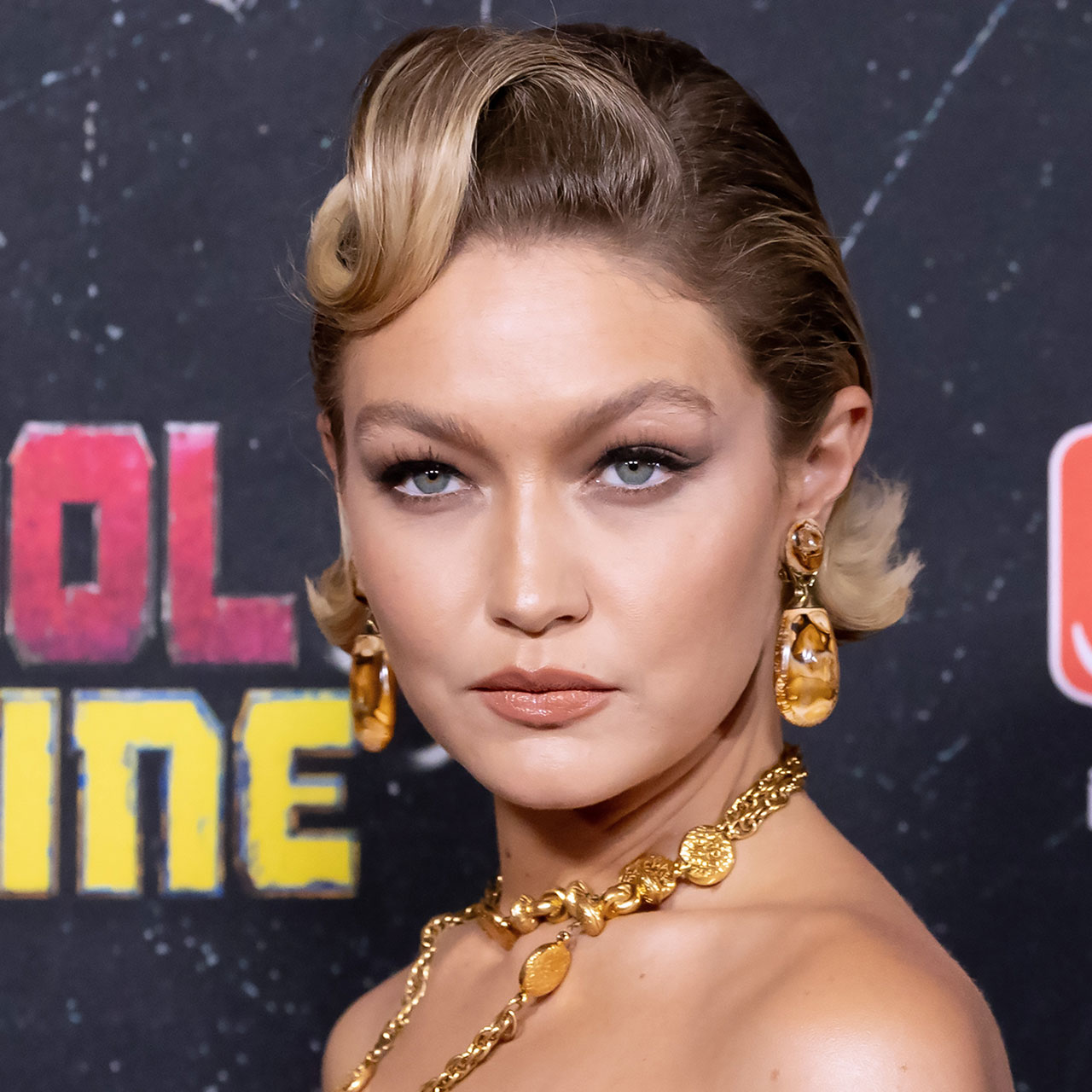 Fans Call Gigi Hadid's Mustard-Yellow Outfit at 'Deadpool & Wolverine' Tacky