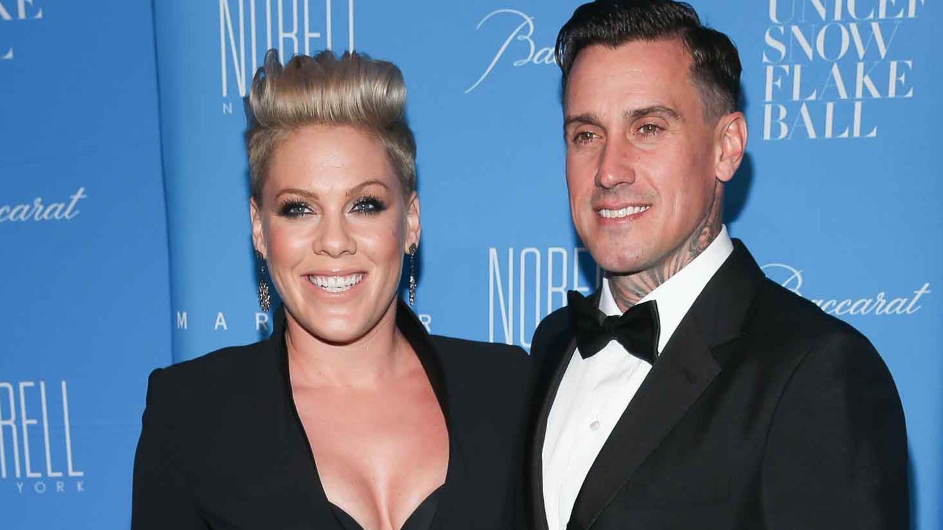 Pink Rocks Swimsuit with Husband Carey Hart for His 49th Birthday Celebration