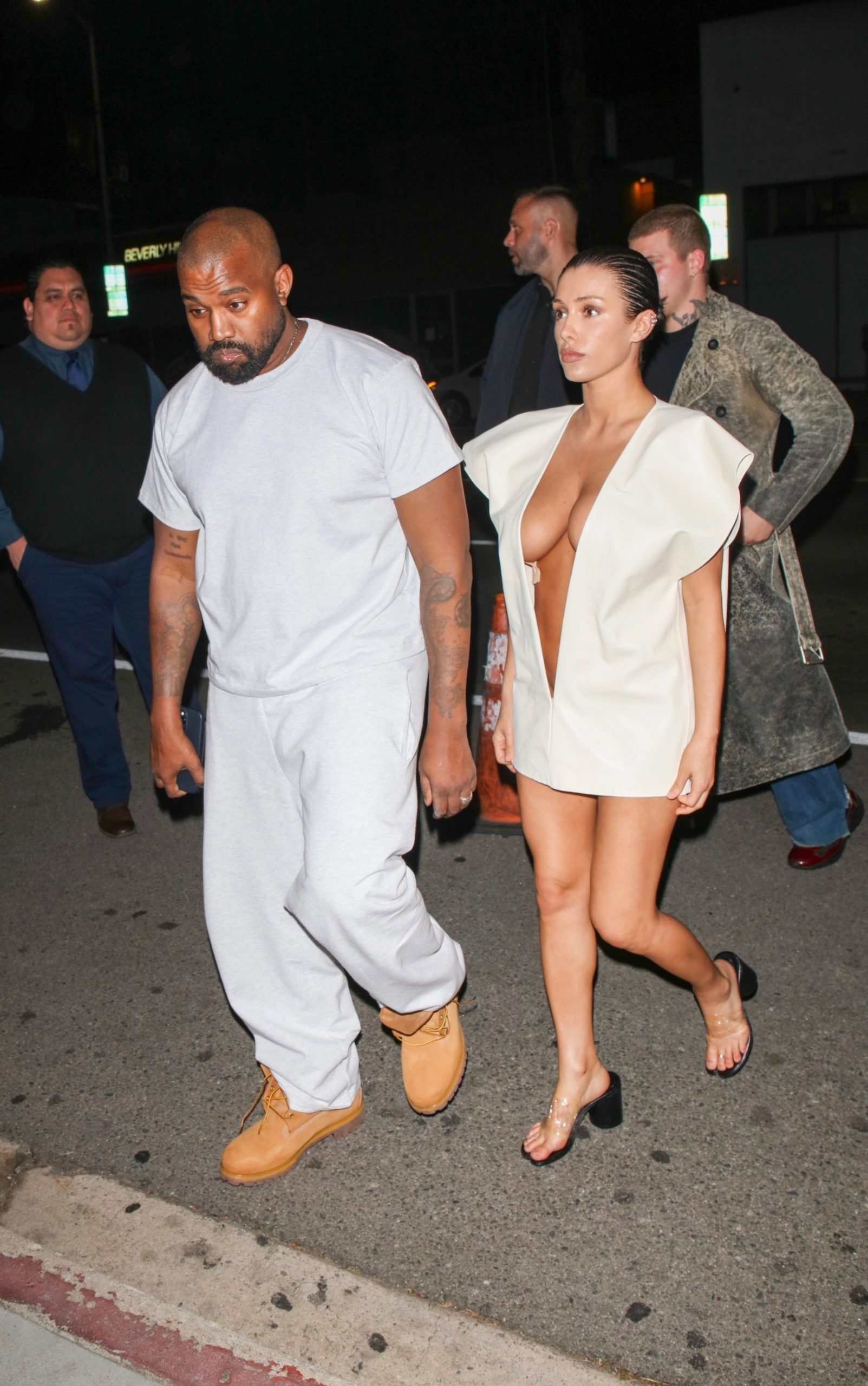 Bianca Censori Sports Metallic Micro Bikini and Clear Heels with Kanye West