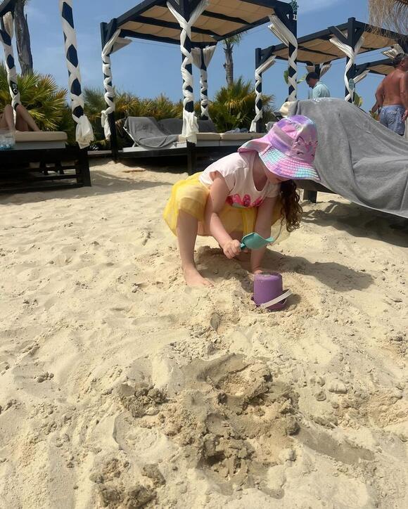 Patricia was hard at work building her sandcastle