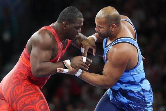 Cuban wrestler Mijain Lopez (left) has won the gold medal in his event at the past five Olympic Games.