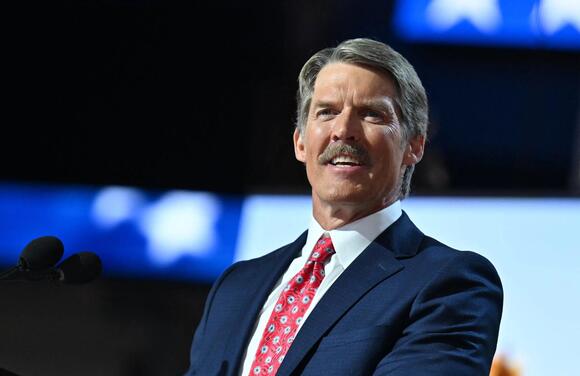 Eric Hovde speaking at a political event