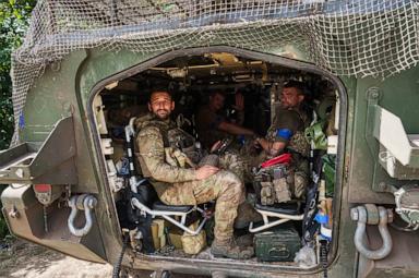 Ukrainian servicemen inside an APC