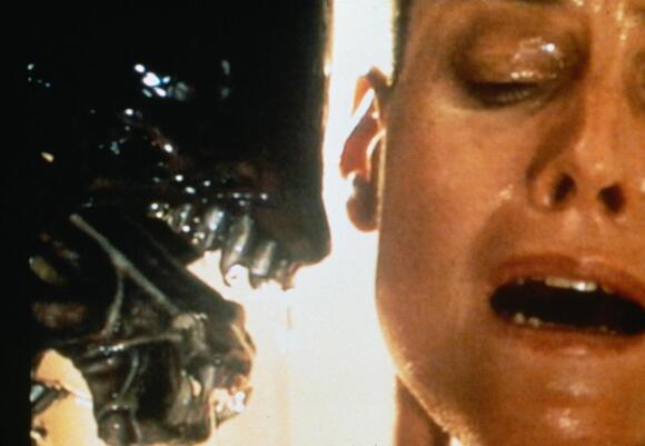 Ripley (Sigourney Weaver) gets up close and personal with a fanged beast in 'Alien 3.' 20TH CENTURY STUDIOS