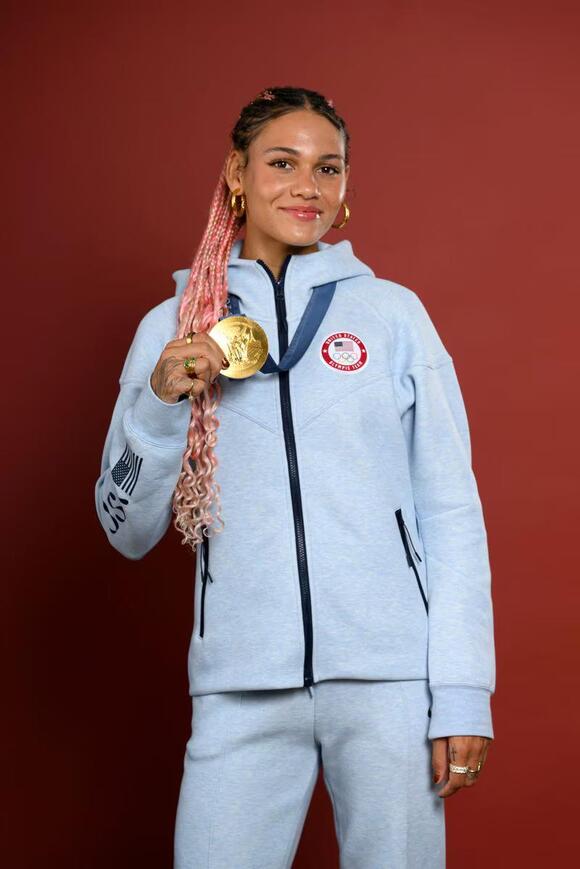 Trinity Rodman poses with her gold medal