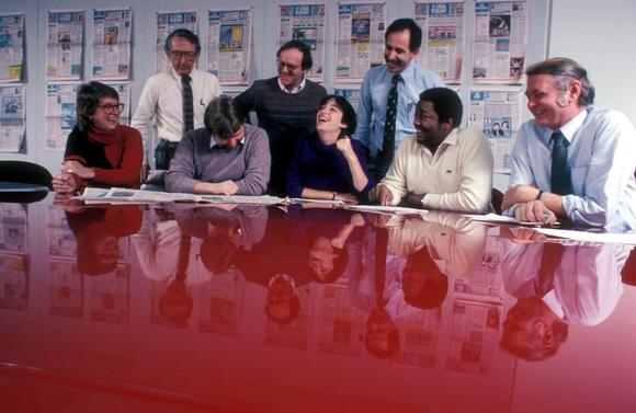 Bob Dubill, right, at a news meeting at USA TODAY. Ted Kawalerski