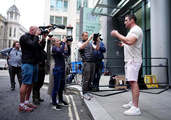 Alex Reid at Katie Price hearing (Aaron Chown/PA)