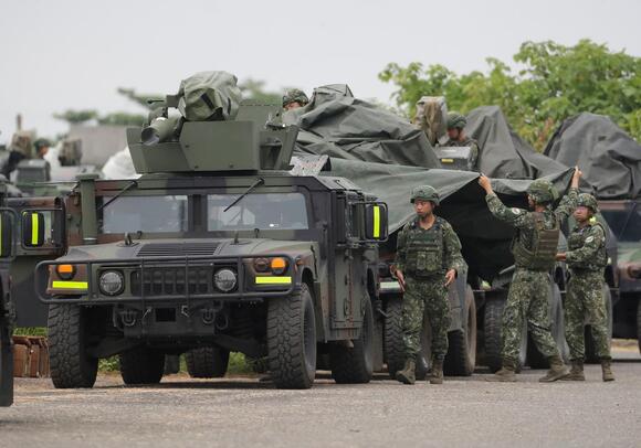 Anti-tank missile carriers during military drills