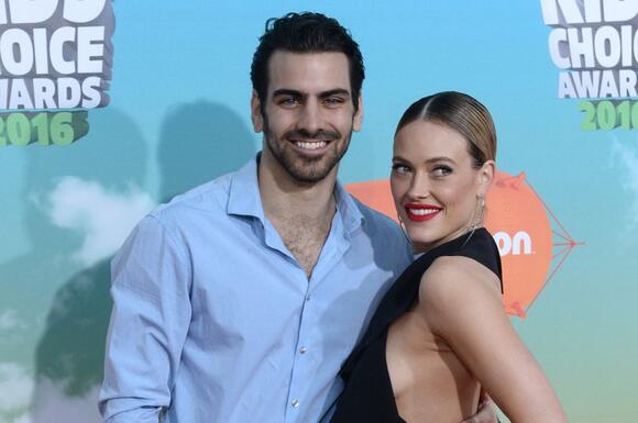 Model Nyle DiMarco and dancer Peta Murgatroyd at Nickelodeon's Kids' Choice Awards in 2016