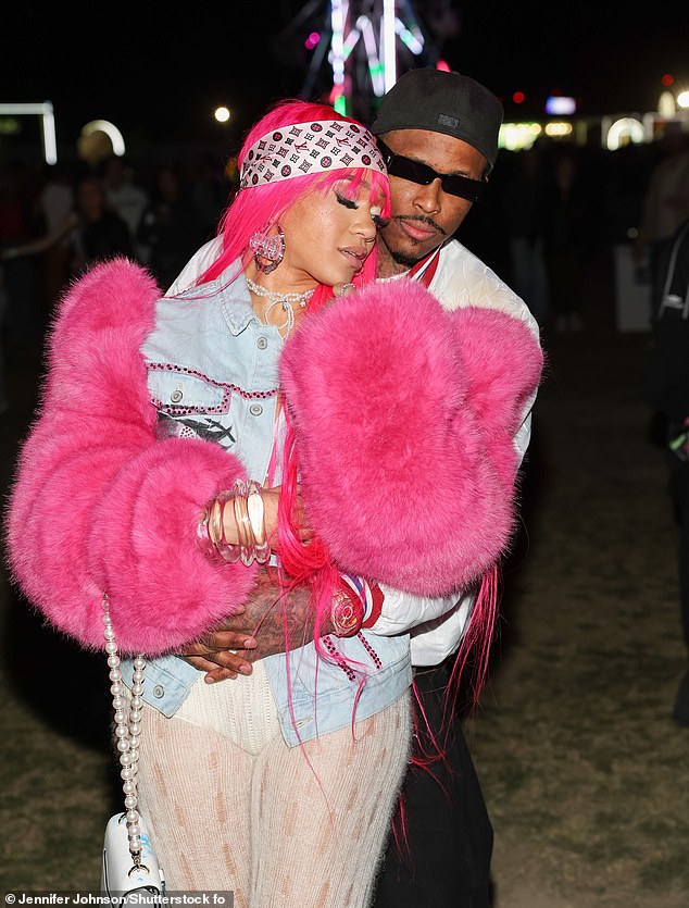 Prior to closing out the last day of the festival, she was allegedly involved in a heated skirmish with her on-again, off-again boyfriend YG. She reportedly had a verbal argument with her beau and fellow rapper, born Keenon Daequan Ray Jackson, over cell phone-related drama at their Los Angeles-area home on Saturday afternoon; seen at Neon Carnival in April