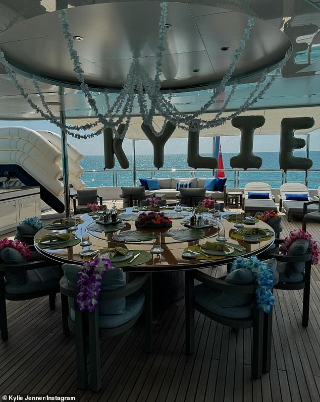 A photo from the deck of her yacht showed a table set for her guests