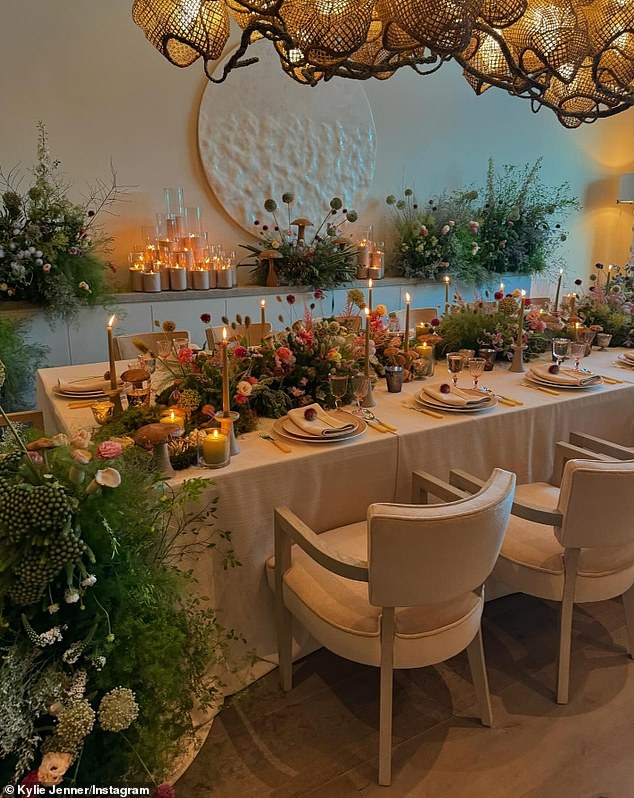 Other images included a more formal dining table covered with flowers and candles and surrounded by more arrangements