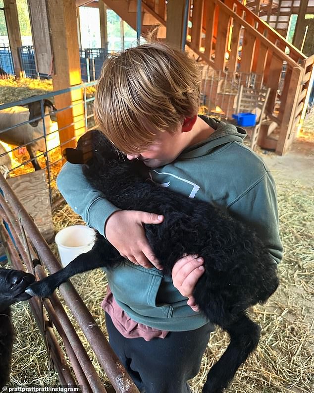 In another photo Pratt shared, his son was cradling an adorable lamb