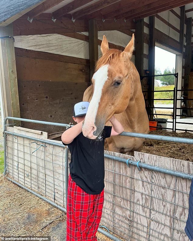 The Parks and Recreation alum also shared a photo of Jack petting a horse