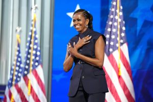 michelle obama wears monse resort 2025 outfit at dnc,CHICAGO, ILLINOIS - AUGUST 20: Former first lady Michelle Obama arrives to speak on stage during the second day of the Democratic National Convention at the United Center on August 20, 2024 in Chicago, Illinois. Delegates, politicians, and Democratic Party supporters are gathering in Chicago, as current Vice President Kamala Harris is named her party's presidential nominee. The DNC takes place from August 19-22. (Photo by Andrew Harnik/Getty Images)