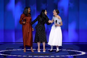 CHICAGO, ILLINOIS - AUGUST 22: (L-R) Helena Hudlin, goddaughter of Vice President Kamala Harris, Meena Harris, niece of Vice President Kamala Harris, and Ella Emhoff, daughter of second gentleman Doug Emhoff and Vice President Kamala Harris speak on stage during the final day of the Democratic National Convention at the United Center on August 22, 2024 in Chicago, Illinois. Delegates, politicians, and Democratic Party supporters are gathering in Chicago, as current Vice President Kamala Harris is named her party's presidential nominee. The DNC takes place from August 19-22. (Photo by Chip Somodevilla/Getty Images)