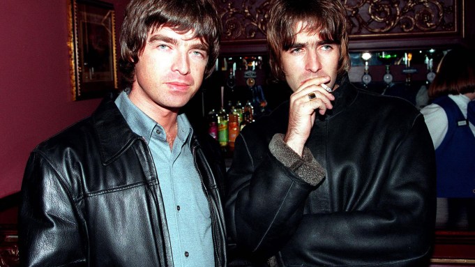 LONDON - 1995: Oasis lead singer Liam Gallagher and brother Noel Gallagher at the opening night of Steve Coogan's comedy show in the West End, London. (Photo by Dave Hogan/Getty Images)