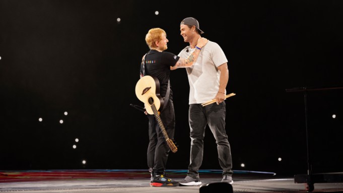 Global superstar Chris Hemsworth joins his friend, GRAMMY Award®-winning singer-songwriter Ed Sheeran, performing the song Thinking Out Loud in front of approximately 60,000 fans in Bucharest, Romania on August 24, 2024. This brain-boosting challenge was filmed for the second season of the Disney+ Original series from National Geographic LIMITLESS WITH CHRIS HEMSWORTH, coming 2025. (National Geographic/Evan Paterakis)