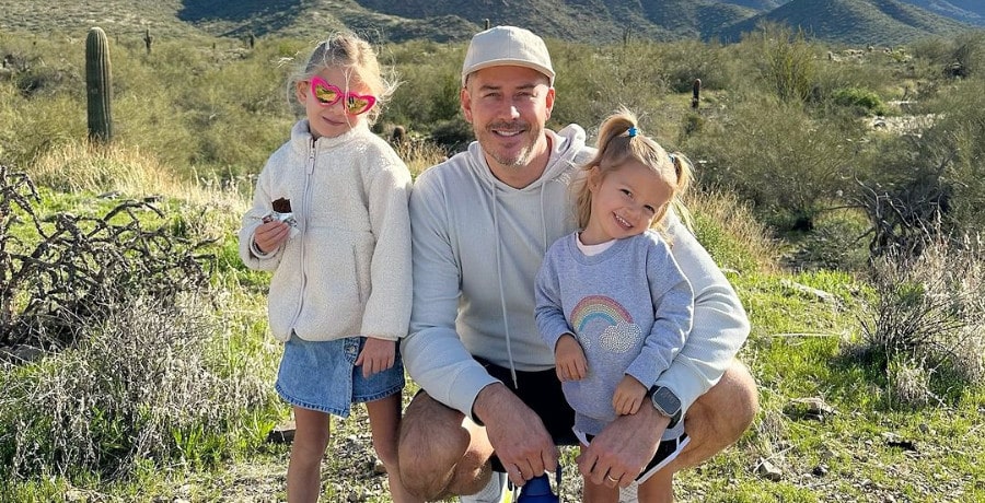 A man and his two daughters