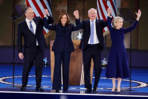 tim walz's wife gwen walz wearing blue carolina herrera bow dress at democratic national convention 2024 last night, kamala harris wears chloe blue suit and husband second gentleman doug emhoff