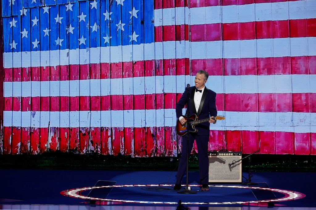 CHICAGO, ILLINOIS - AUGUST 19: Music artiest Jason Isbell performs during the first day of the Democratic National Convention at the United Center on August 19, 2024 in Chicago, Illinois. Delegates, politicians, and Democratic party supporters are in Chicago for the convention, concluding with current Vice President Kamala Harris accepting her party's presidential nomination. The DNC takes place from August 19-22. (Photo by Chip Somodevilla/Getty Images)