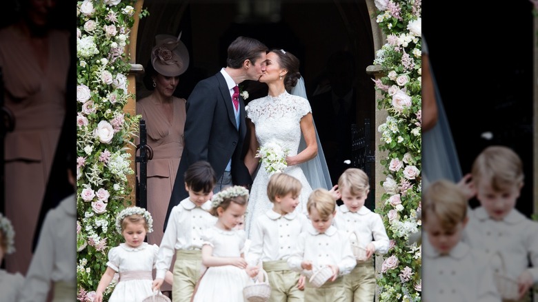 Pippa Middleton and James Matthews kiss at wedding