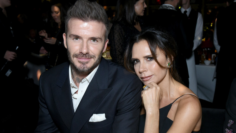 David and Victoria Beckham smiling