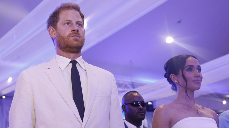 Meghan Markle and Prince Harry standing together/