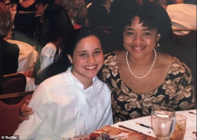 A doting grandmother to Archie and Lilibet, Doria is pictured smiling with Meghan as a child