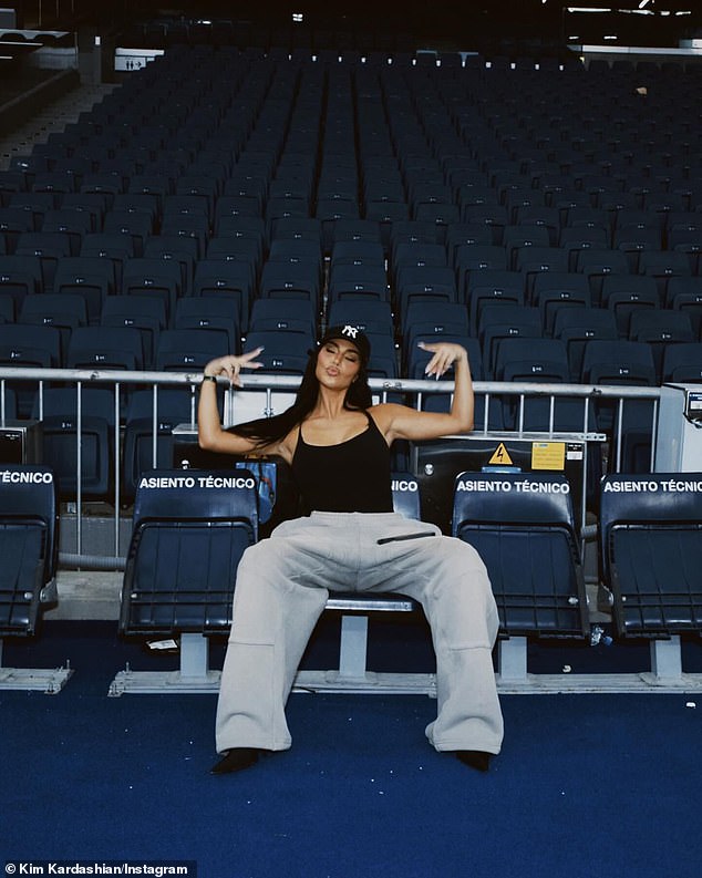 She also posted a solo shot of her once again posing with peace signs in the stands