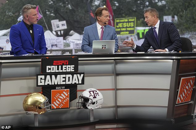 From left, Pat McAfee, Nick Saban and Kirk Herbstreit talk on ESPN College Gameday