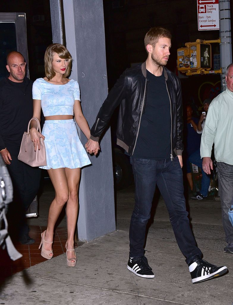 Taylor Swift walking holding calvin harris' hand