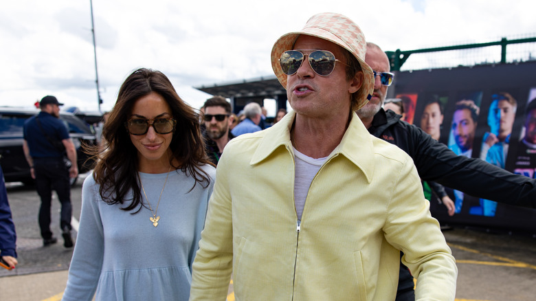 Ines de Ramon blue dress Brad Pitt bucket hat