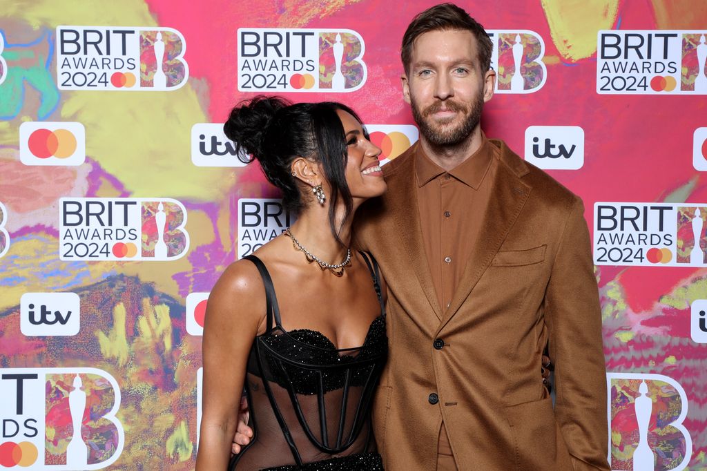 couple at BRIT Awards on red carpet 